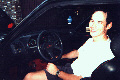 Marcel in his Peugeot 205 GTI